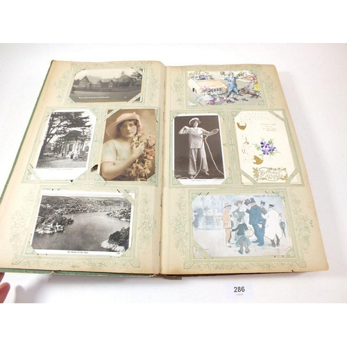 286 - Postcards - album with topographical celebs/beauties, comic etc. artists include Jotter, Gilson etc.... 