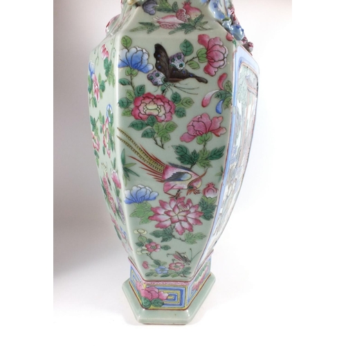 373 - A pair of late 19th century Chinese famille rose large vases with panelled decoration painted garden... 