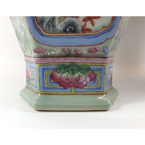 373 - A pair of late 19th century Chinese famille rose large vases with panelled decoration painted garden... 