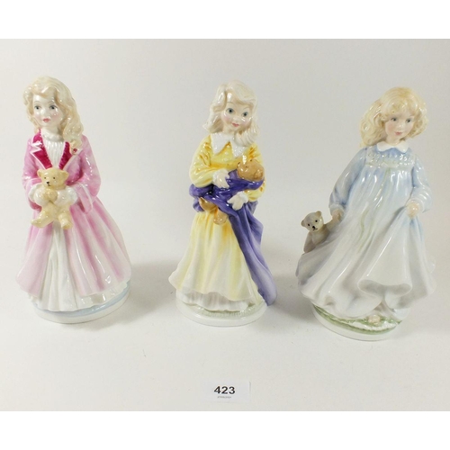 423 - A Royal Doulton set of three figures 'Faith, Hope and Charity'