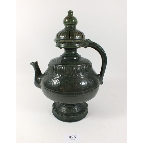 425 - A green glaze coffee pot, possibly of Russian design, 29cm