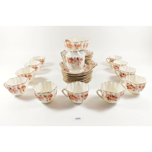 445 - An Edwardian Bone China tea service comprising: eleven cups and saucers, eleven tea plates, two cake... 