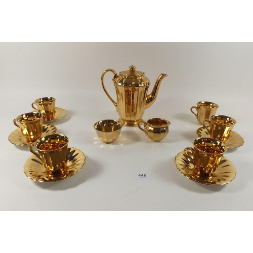 446 - A Wade heavy gilt pottery teaset consisting teapot, sugar, cream jug, six cups and five saucers