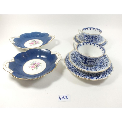 453 - Two Coalport floral painted dishes and a pair of Coalport blue and white breakfast cups and saucers ... 