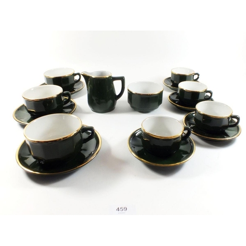 459 - A French Apilco green glaze coffee bistro set comprising foursmall cups and saucers, four large cups... 