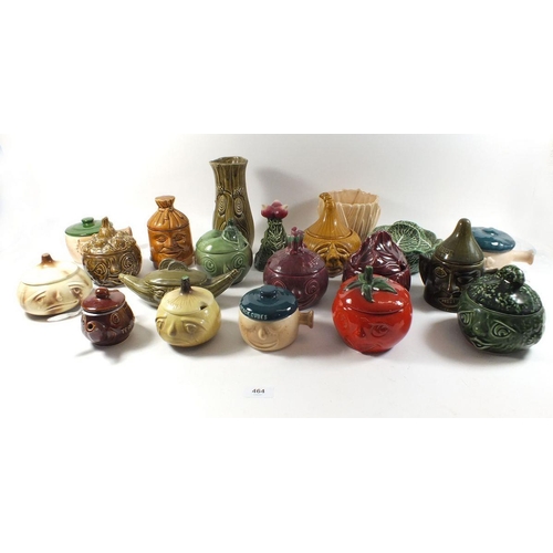 464 - A large selection of 1960s novelty pottery condiment jars in the form of fruit and vegetables, mainl... 