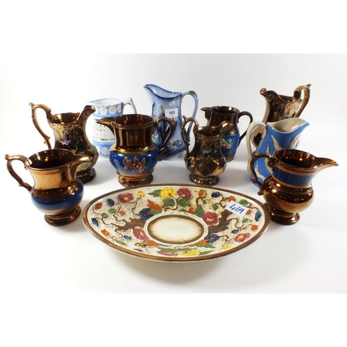 469 - A collection of Victorian Staffordshire and lustre jugs