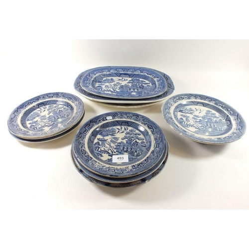 493 - A collection of various 19thC blue and white meat plates and dinner plates, mainly Willow pattern