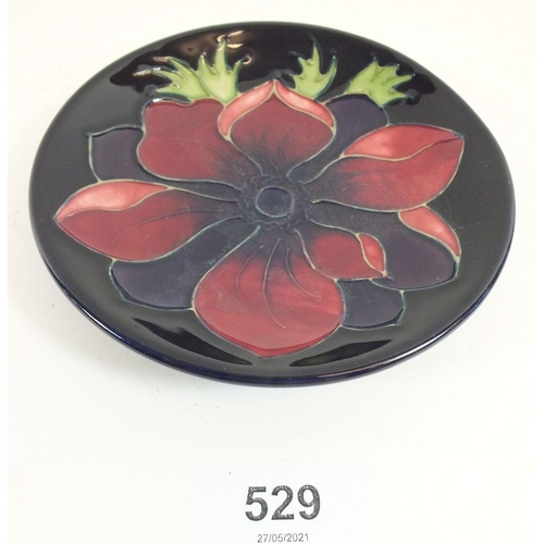 529 - A Moorcroft Blue Anenome pin dish, 12cm diameter