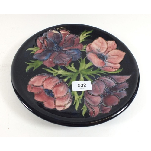 532 - A Moorcroft Blue Anenome plate, 26cm diameter