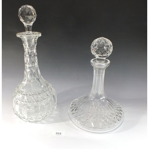 555 - Two cut glass decanters, tallest 33cm