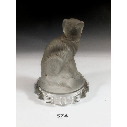 574 - A Victorian pressed glass dog - 13cm