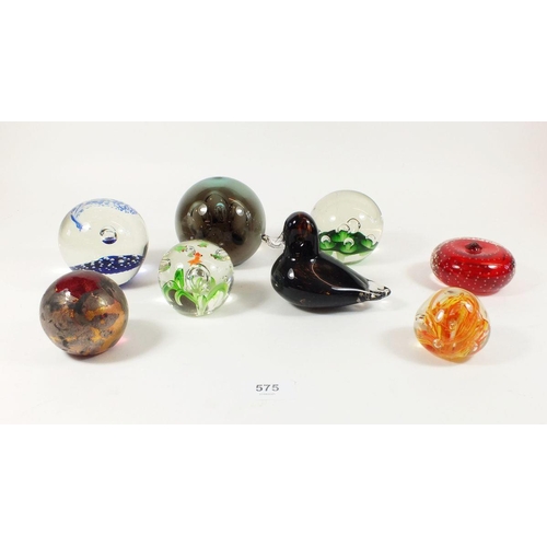 575 - A selection of eight glass paperweights to include an Isle of Wight example