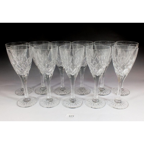 577 - A set of eleven large cut glass wine glasses