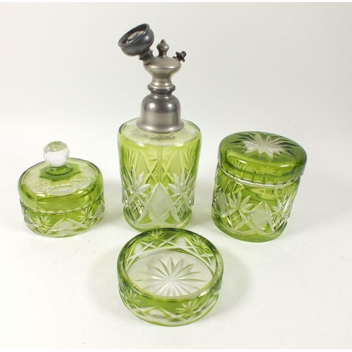 578 - A green flashed and cut glass atomiser and three similar dressing table items