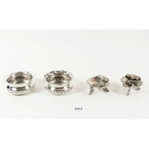 603 - A pair of silver plated shell form salts and spoons and another pair of silver plated salts