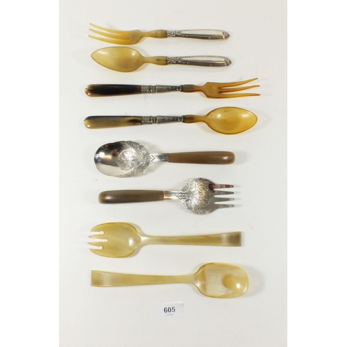 605 - A pair of silver and horn salad servers and three other pairs of horn salad servers