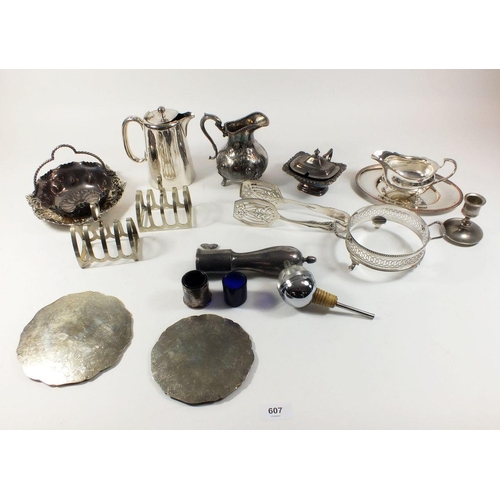 607 - A box of silver plated items to include jugs, toast racks etc