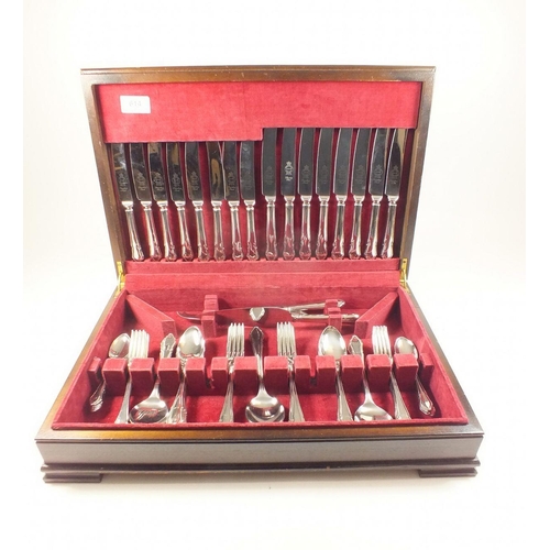 614 - A Sheffield stainless steel cutlery set - boxed, eight place settings