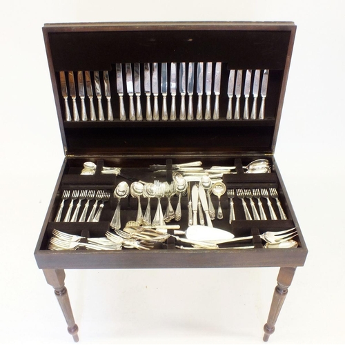 623 - A cutlery table and contents of silver plated cutlery