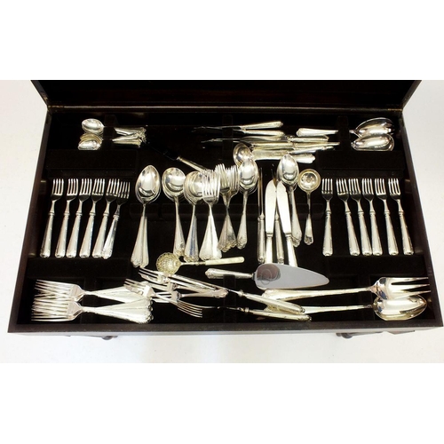 623 - A cutlery table and contents of silver plated cutlery