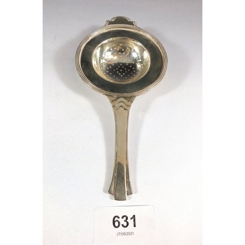 631 - A silver tea strainer, Sheffield 1945, 69g