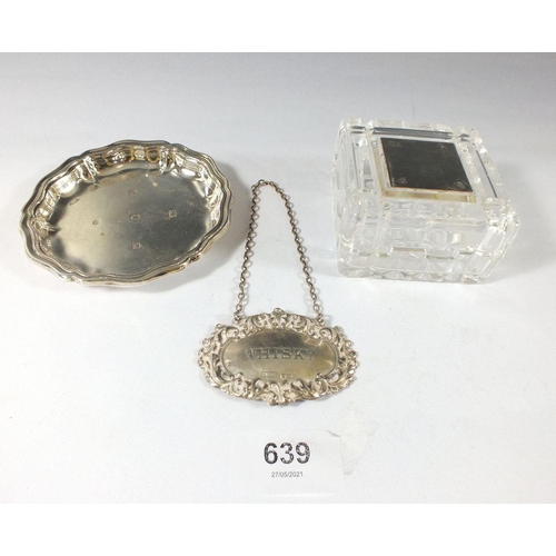 639 - A silver pin dish, 60g, silver whisky decanter label, 14g and a cut glass box with silver lid