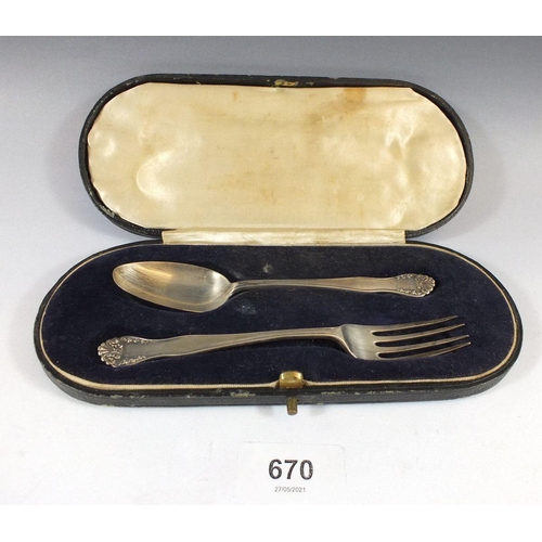 670 - A silver christening spoon and fork gift set in original case,  London 1921