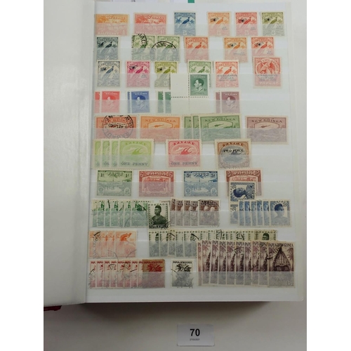 70 - Papua New Guinea: Large, c 60 page, stock-book of mint & used defin, commem etc plus 2 year-books fo... 