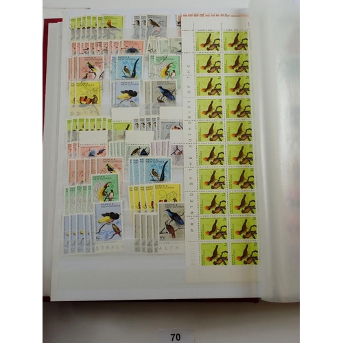 70 - Papua New Guinea: Large, c 60 page, stock-book of mint & used defin, commem etc plus 2 year-books fo... 