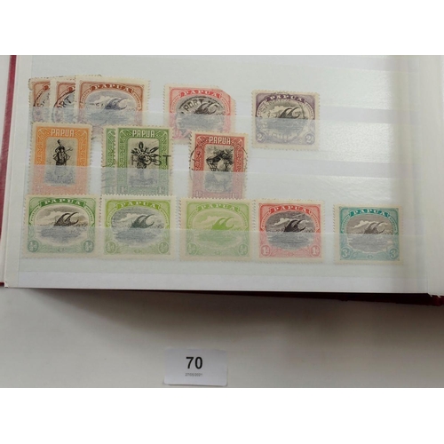 70 - Papua New Guinea: Large, c 60 page, stock-book of mint & used defin, commem etc plus 2 year-books fo... 