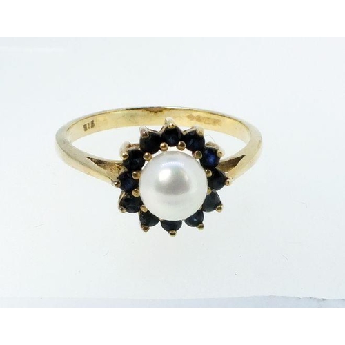 768 - A 9 carat gold pearl and sapphire cluster ring, size O, 2g