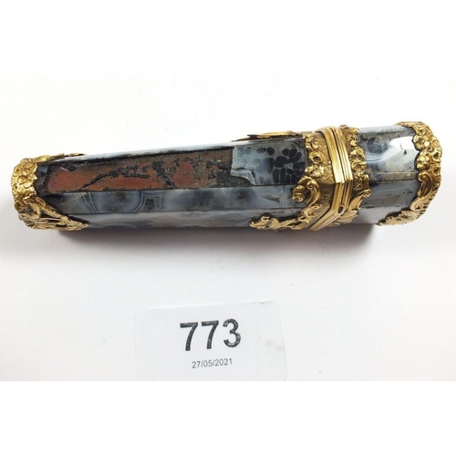 773 - An 18th century grey agate etui mounted with gold scrollwork decoration and set diamond, the hinged ... 