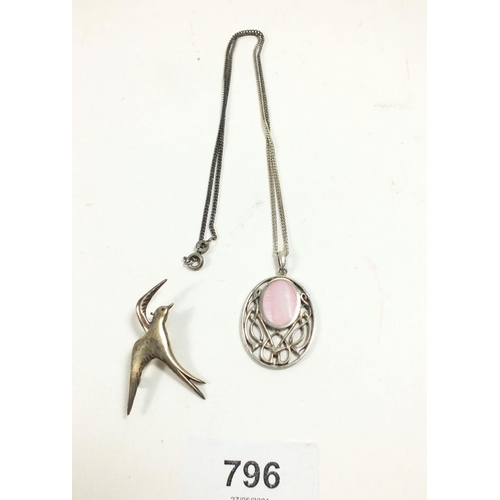 796 - A sterling silver swallow brooch and a silver pendant