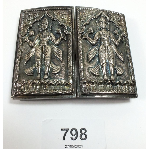 798 - An Indian white metal buckle decorated goddess, 7 x 8cm