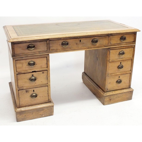 1018 - A Victorian pine twin pedestal desk with leather inset top, 77cm high, 122cm length, 60cm depth