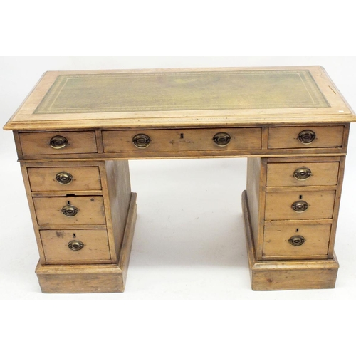 1018 - A Victorian pine twin pedestal desk with leather inset top, 77cm high, 122cm length, 60cm depth