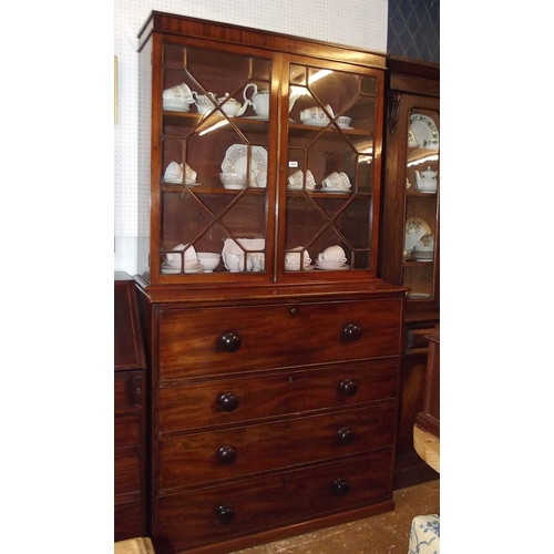 1023 - A 19th century mahogany secretaire bookcase with two glazed doors over associated base with secretai... 