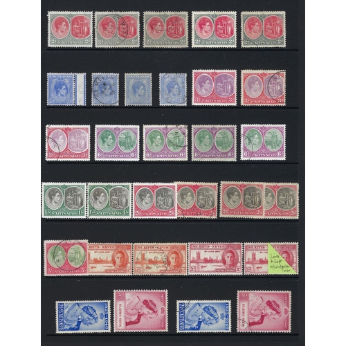 128 - St Kitts-Nevis: QV-QEII mint & used twelve page collection in white folder. Defin, commem & fiscal. ... 