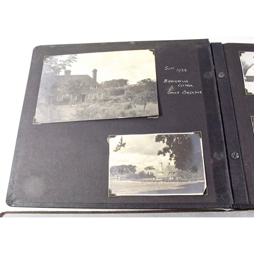 411 - Photograph albums (2) containing mix family/military life photos include 1942 Malta convoy with airc... 