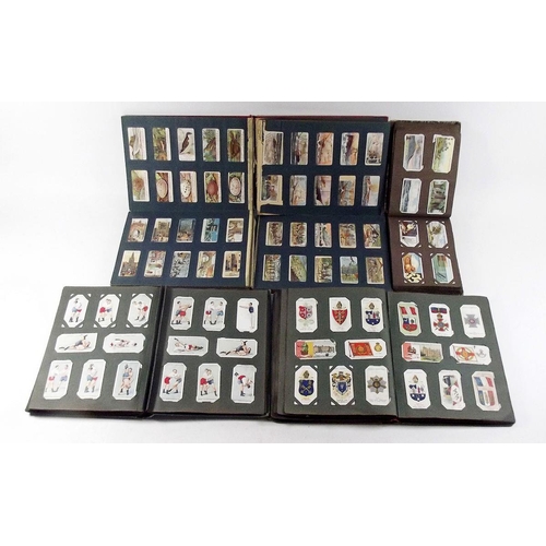 412 - Cigarette cards - in slot in albums including Players 1904 British Empire series, Life on board a Ma... 