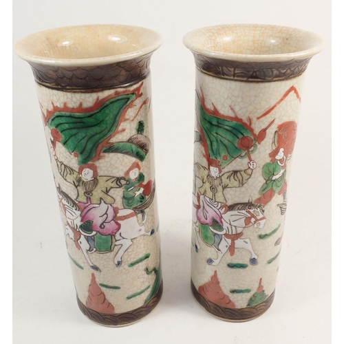 108 - A pair of Japanese crackle glaze cylindrical vases, painted warriors, 25cm tall