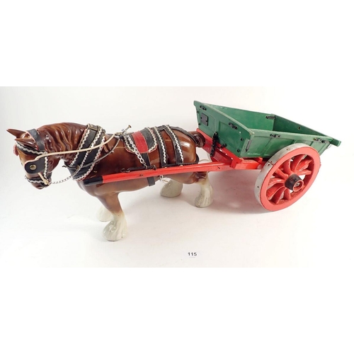 115 - A large china shire horse with wooden model cart