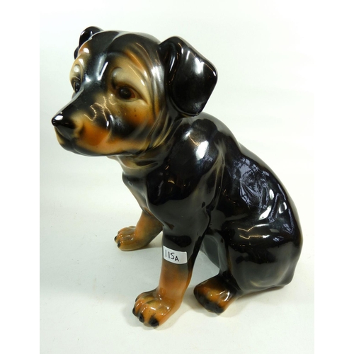 115A - A large fireside china Rotweiler puppy, 39cm