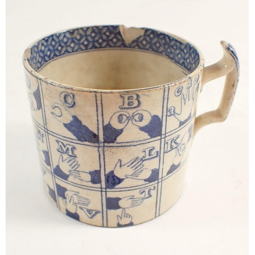 122 - An 18th century pottery sign language cup, 6cm high, a/f