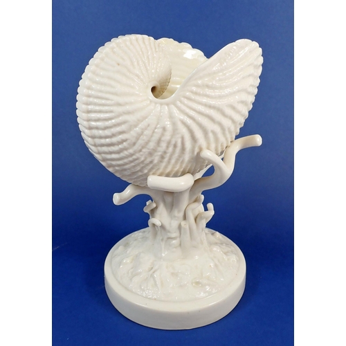 126 - A 19th century Belleek nautilus shell on coral base, 22cm tall