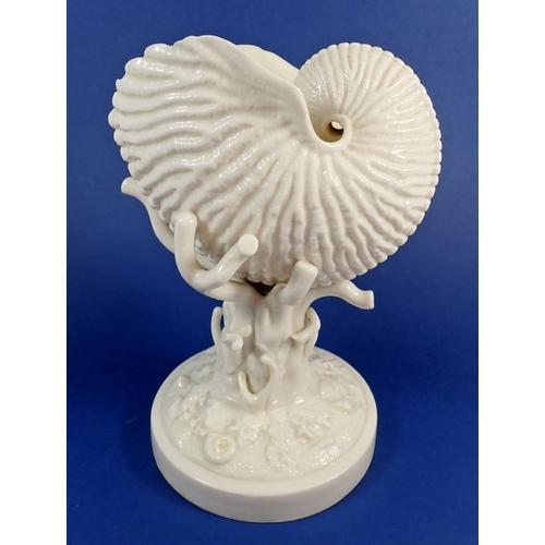 126 - A 19th century Belleek nautilus shell on coral base, 22cm tall