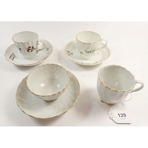 129 - Two Worcester 18th century cups and saucers with green and brown spray decoration and a white fluted... 