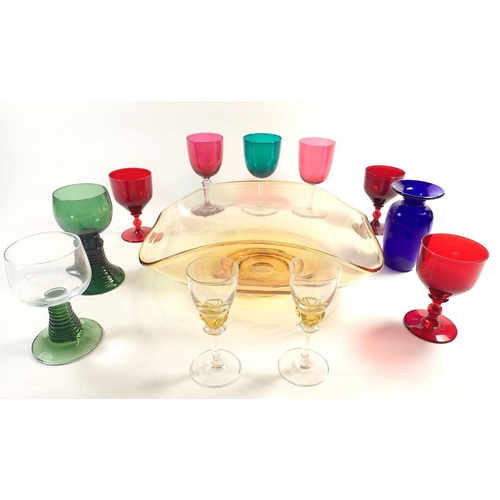 145 - Various coloured drinking glasses and a Whitefriars style yellow glass dish with folded rim