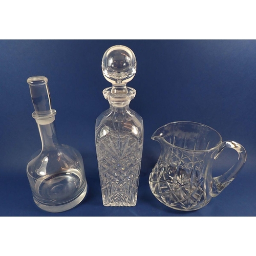 158 - A Dartington glass decanter, a cut glass decanter and a jug